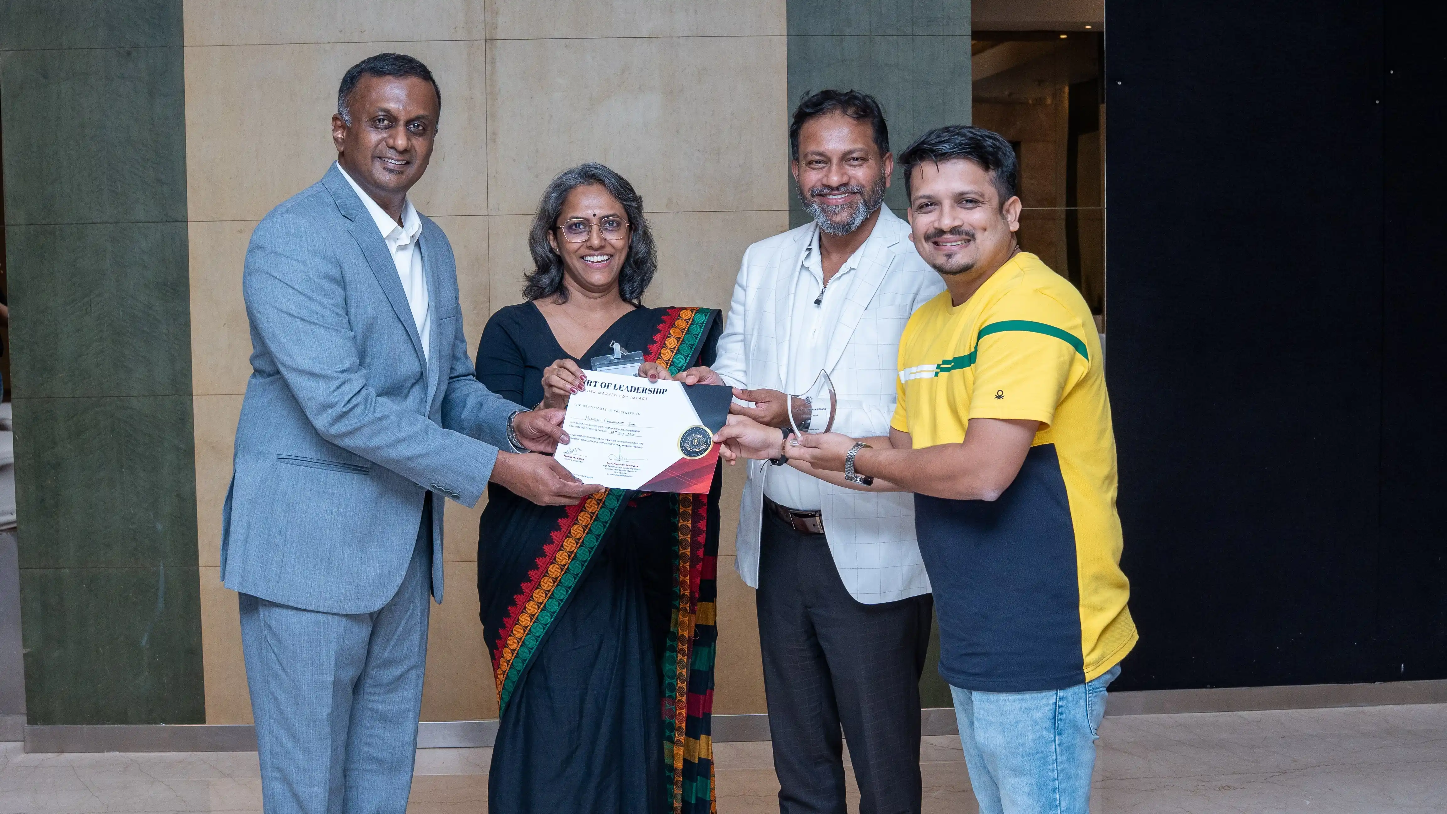 Certificate and award presentation at a Skill Beyond Education event.